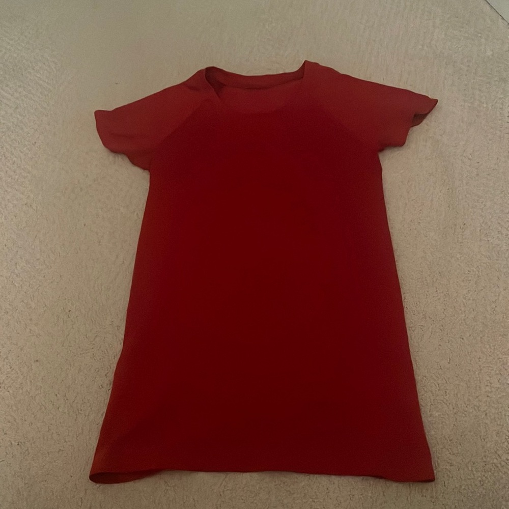 size 2 swiftly tech short sleeve, dark red, worn but perfect condition